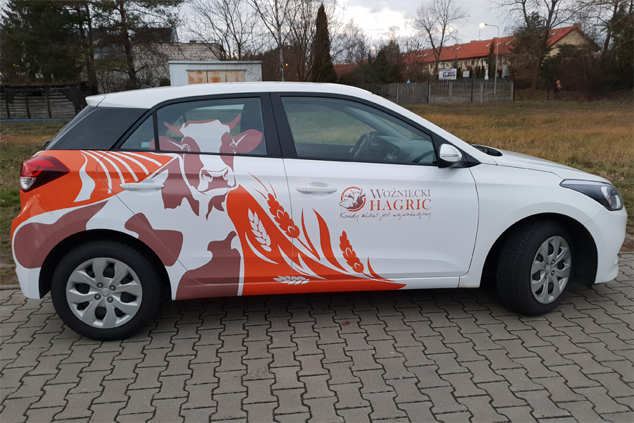 Reklama na samochodzie Woźniecki HAGRIC